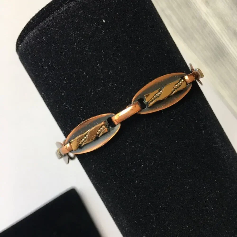 Copper tone abstract design link bracelet